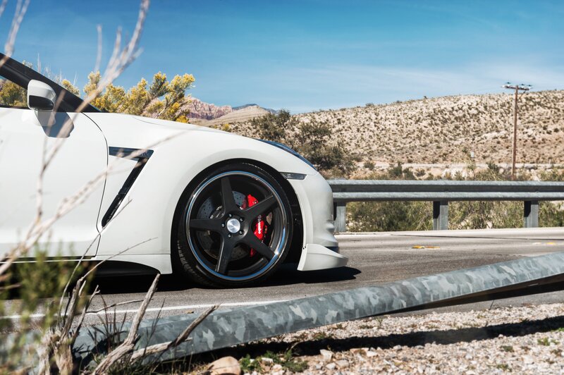 White sports car on desert road