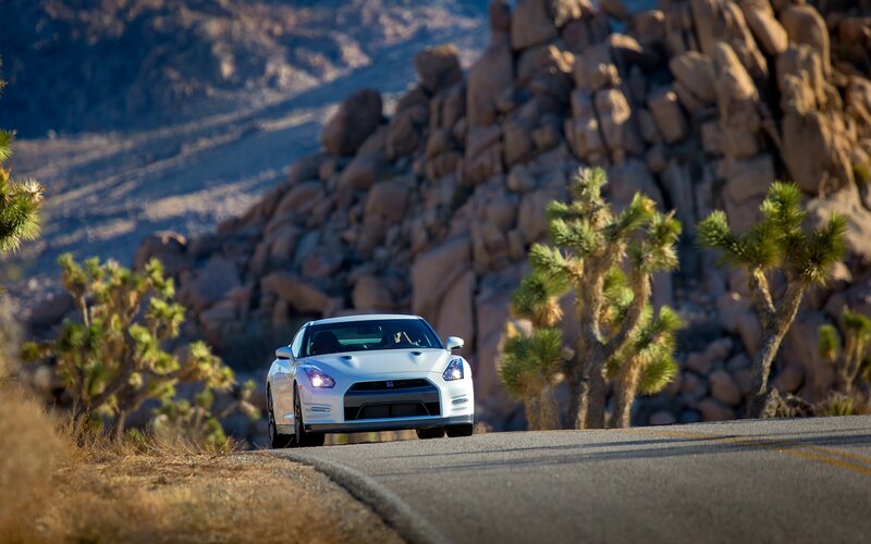 White sports car on desert road