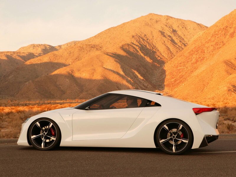 White sports car on desert road