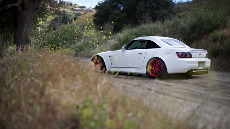 White Sports Car on Dirt Road — Serene