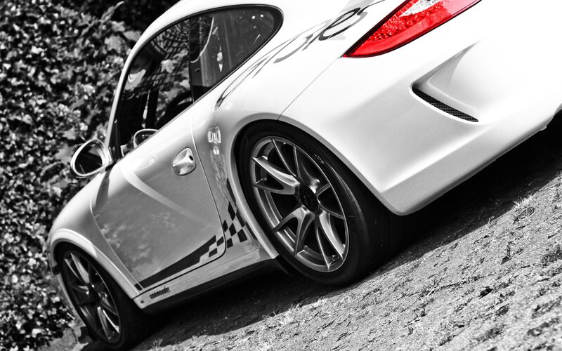 white sports car on dirt