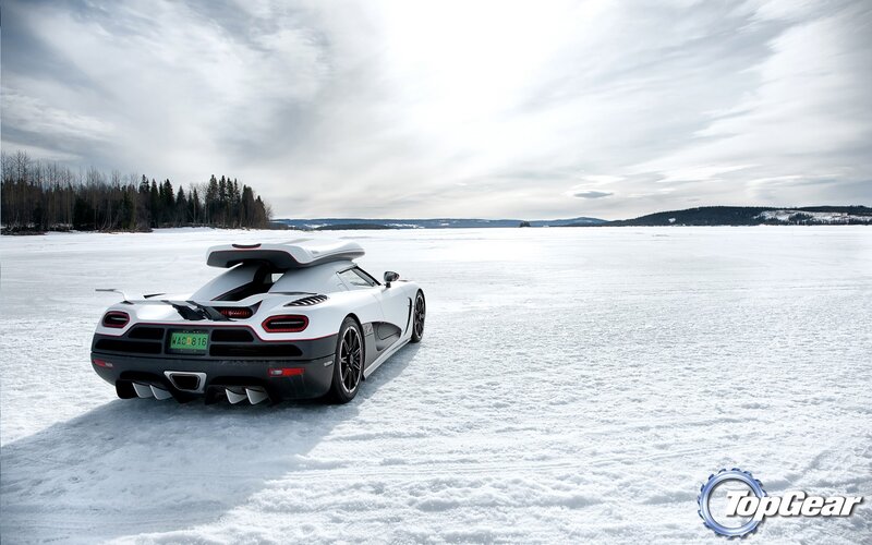 White sports car on frozen lake