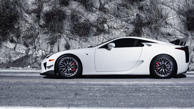 white sports car on mountain road