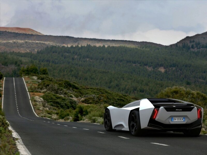 White sports car on mountain road