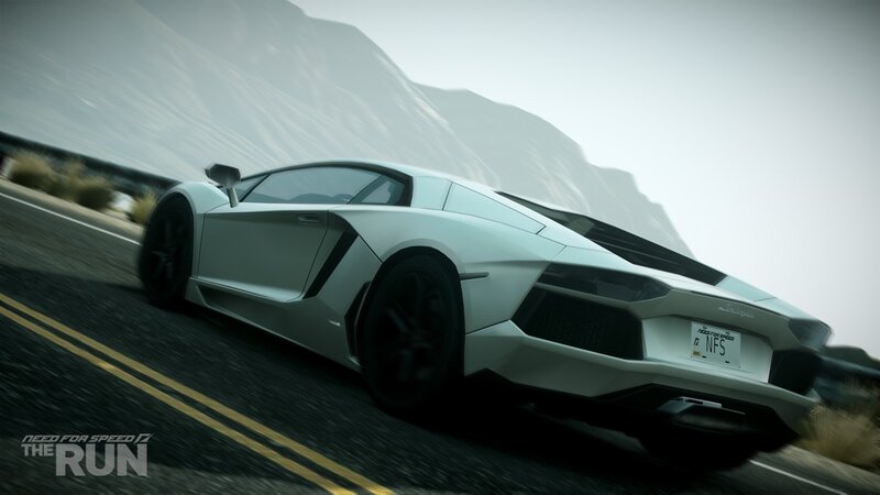 white sports car on mountain road