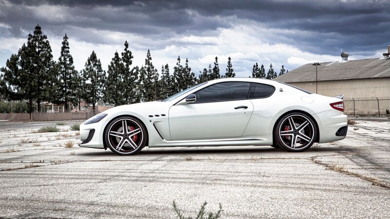 white sports car on pavement