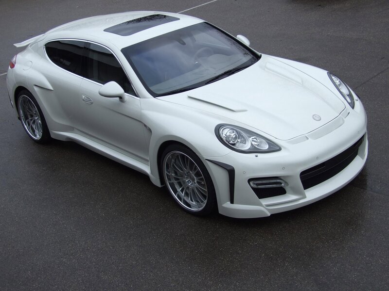 white sports car on pavement