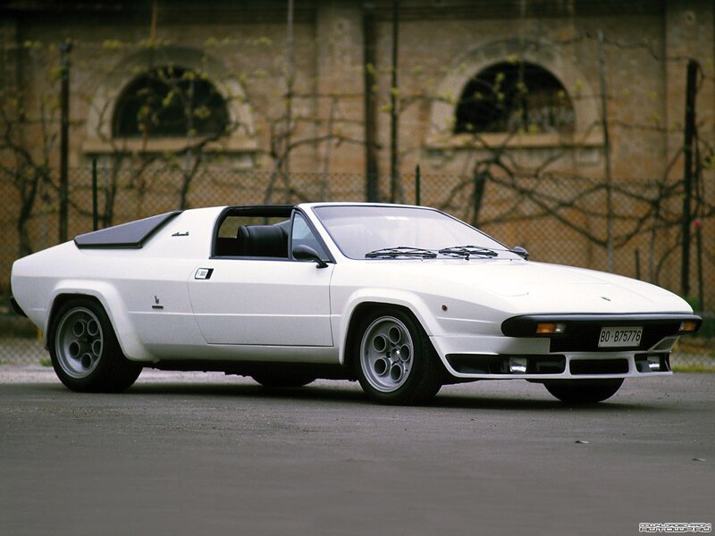 white sports car on pavement