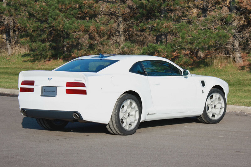 white sports car on pavement