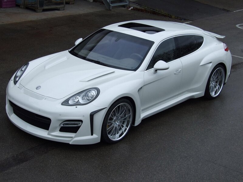 white sports car on pavement