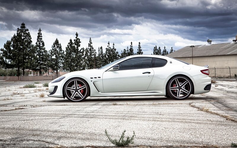 white sports car on pavement
