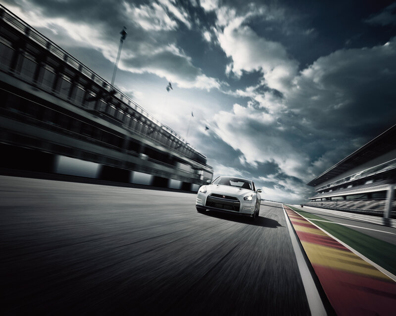 White sports car on racetrack
