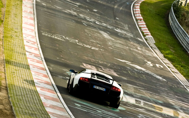White sports car on racetrack