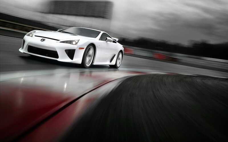 White sports car on racetrack