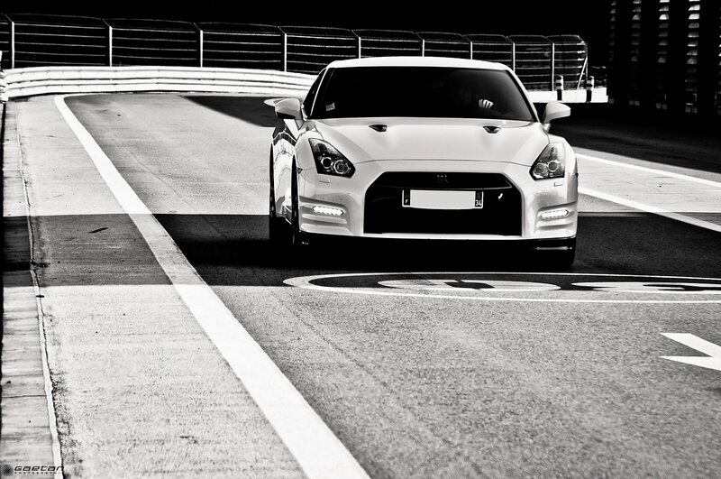 White sports car on racetrack