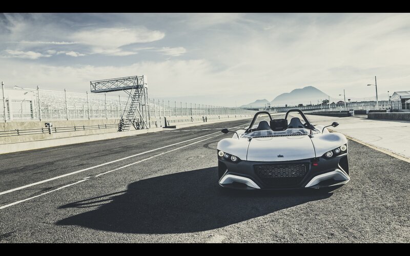 White sports car on racetrack