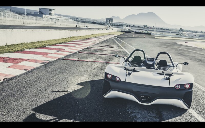 White sports car on racetrack