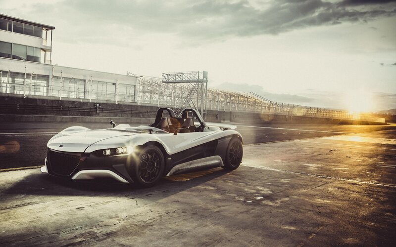 White sports car on racetrack