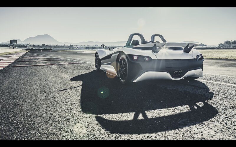 White sports car on racetrack