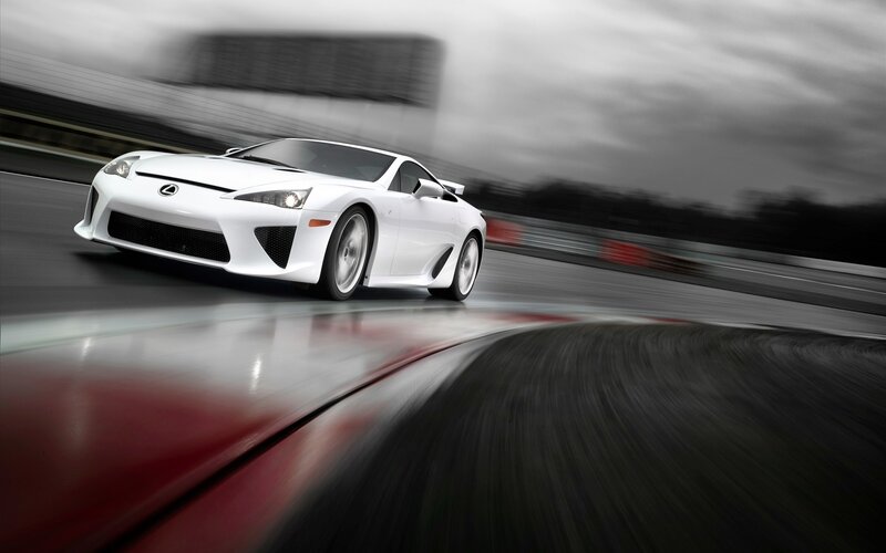 White sports car on racetrack