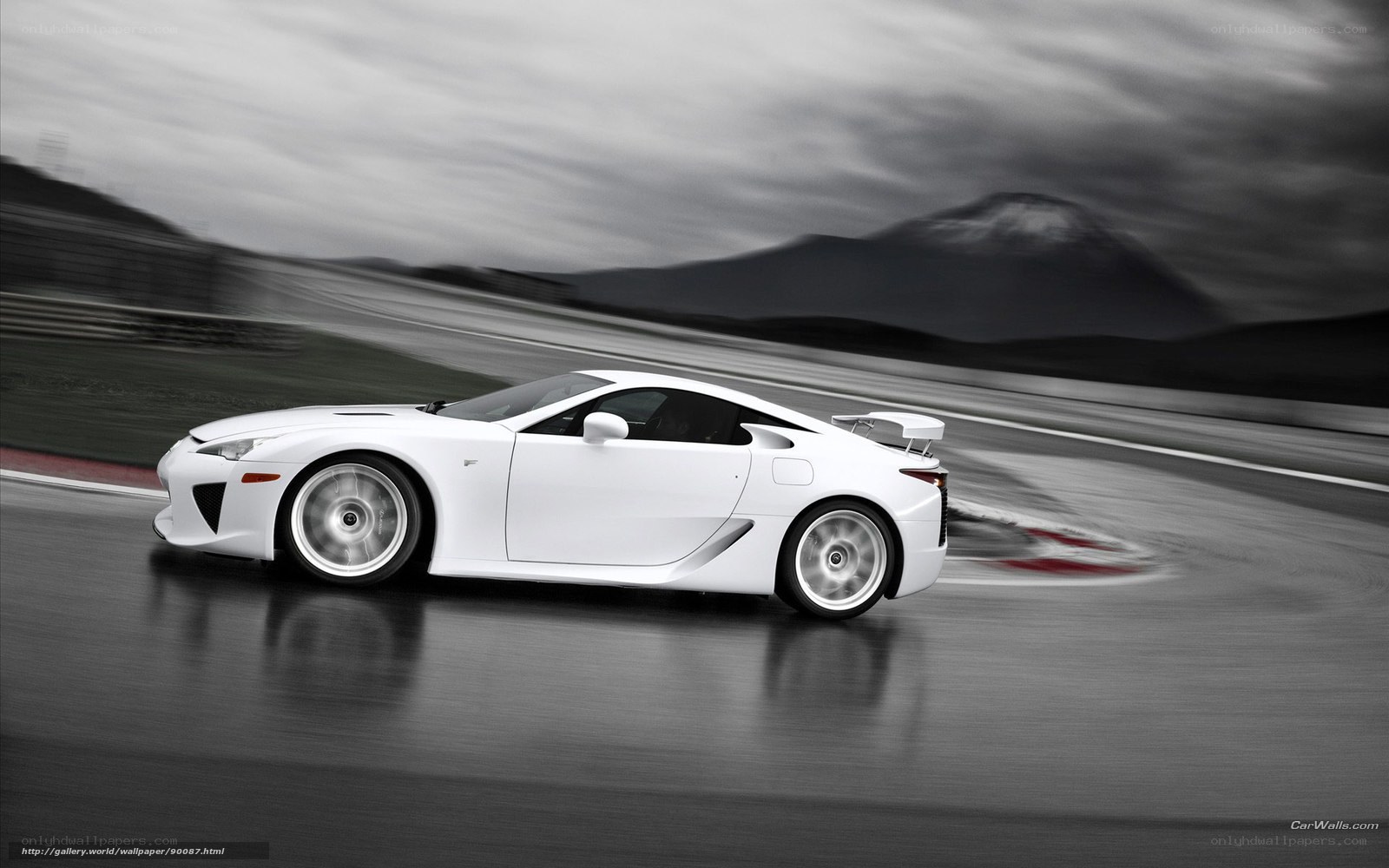 White sports car on racetrack
