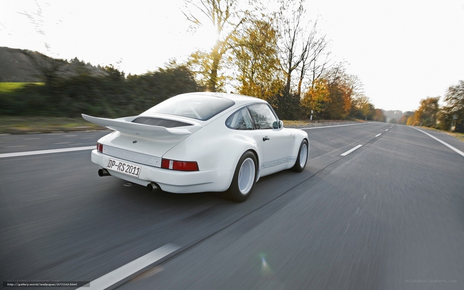 white sports car on road