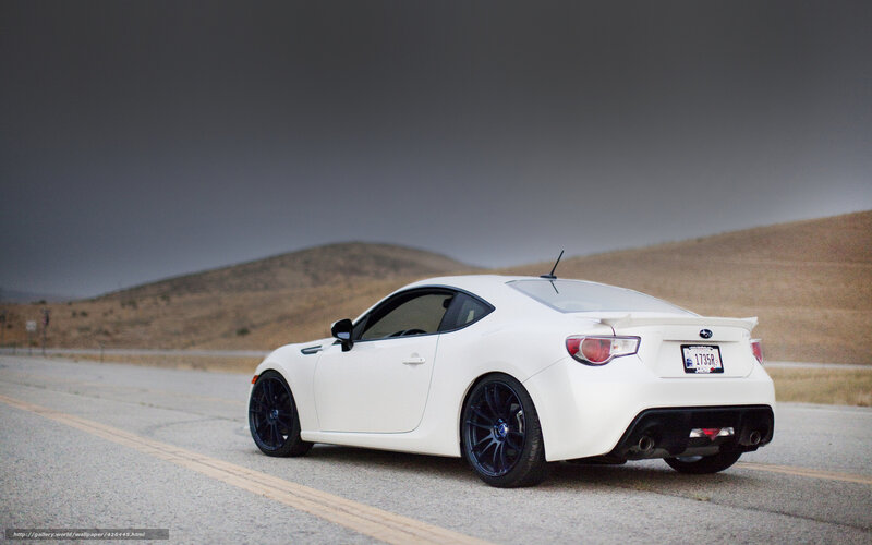 white sports car on road