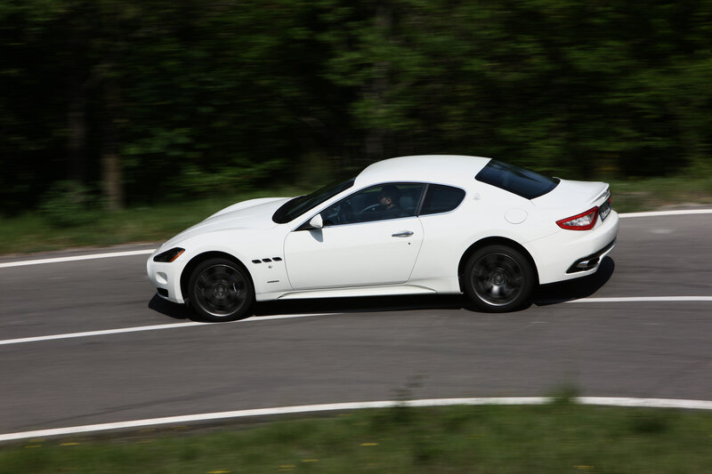 white sports car on road
