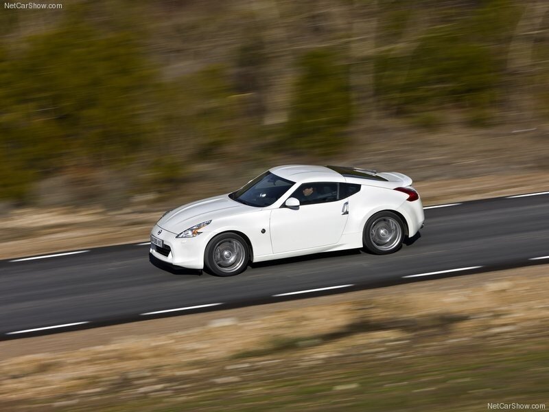 white sports car on road