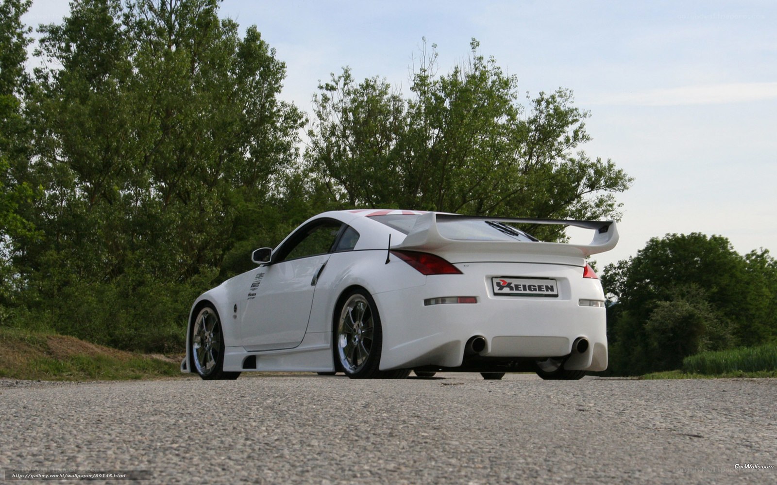 white sports car on road