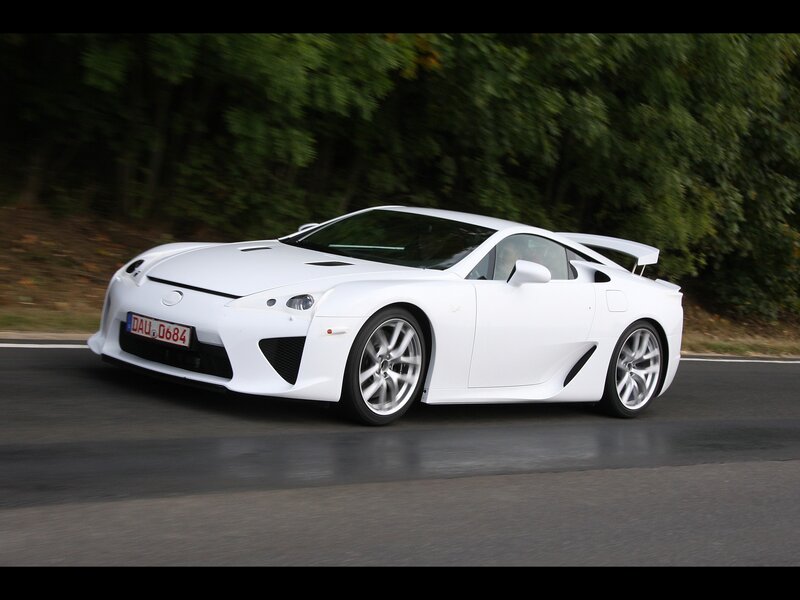 white sports car on road