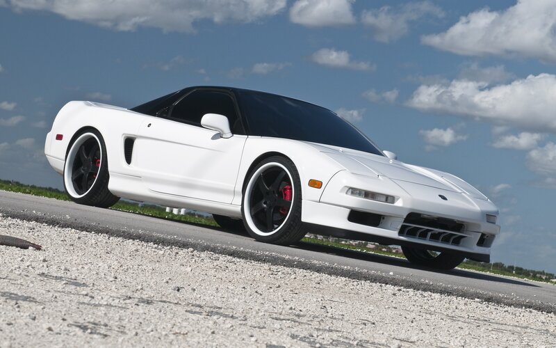 white sports car on road