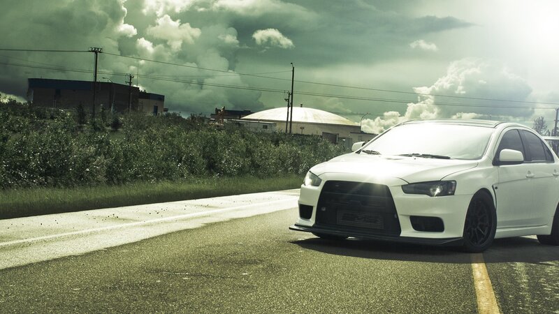 white sports car on road