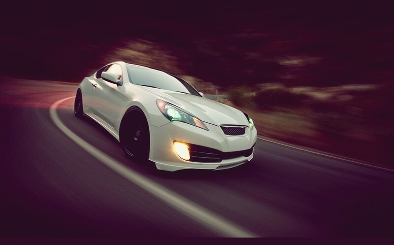 white sports car on road