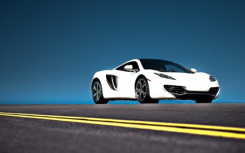 White sports car on road