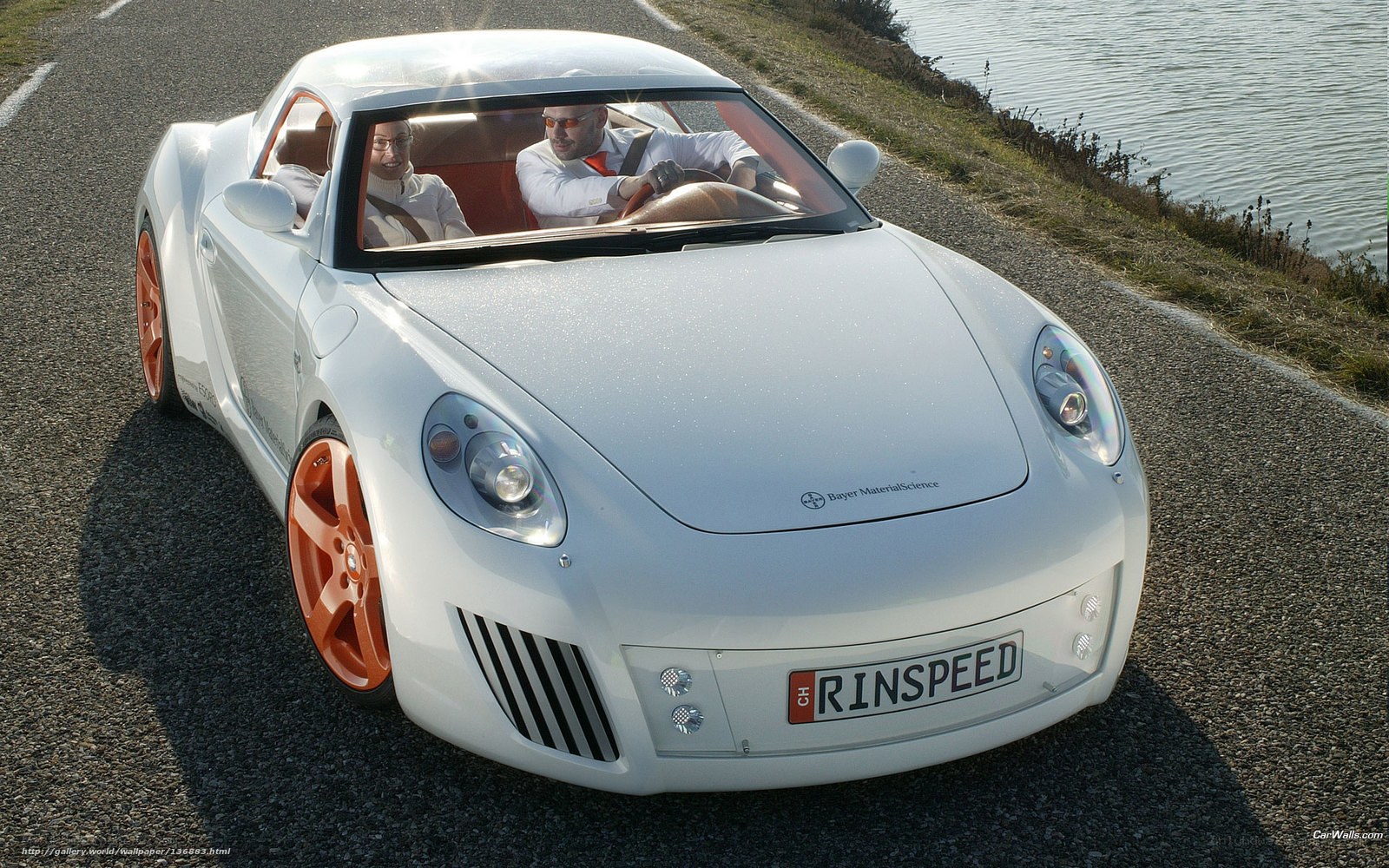 white sports car on road