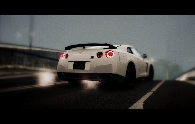 white sports car on road