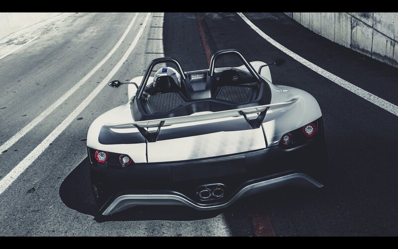white sports car on road