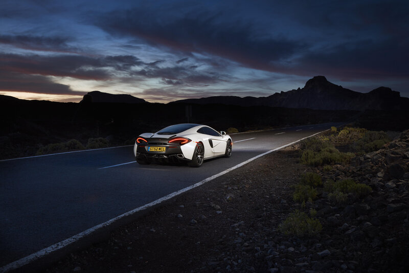 White Sports Car on Road — Dramatic, Sunset