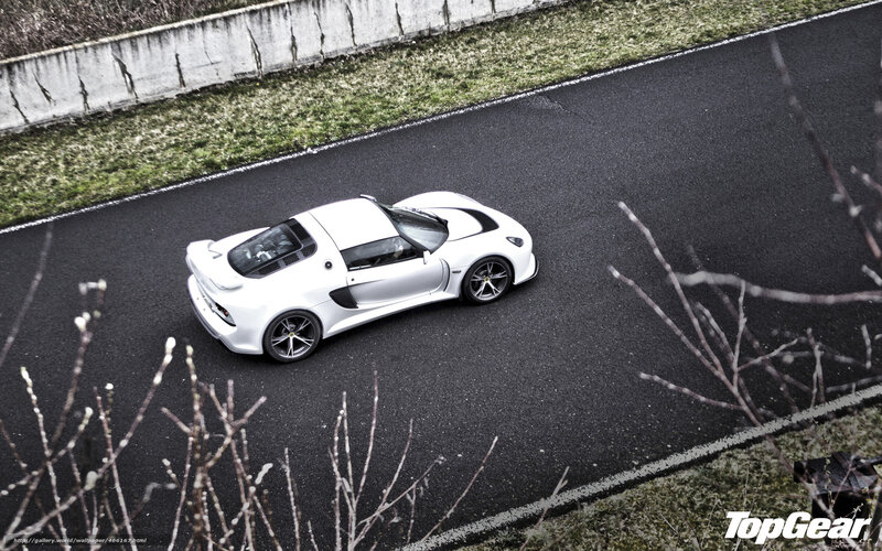 White Sports Car on Road — Dramatic, Winter