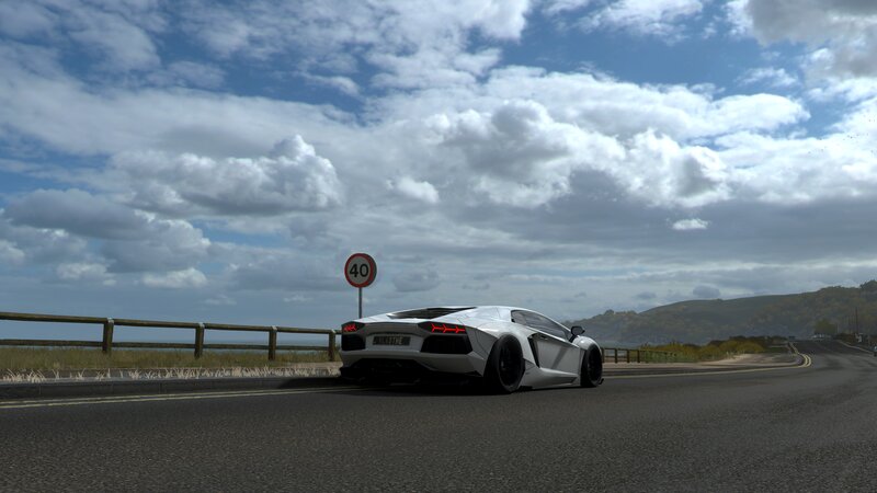 White Sports Car on Road — Gray, Serene, Afternoon