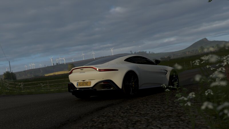 White Sports Car on Road — Serene, Sunset, 3d Render, Wind Turbines
