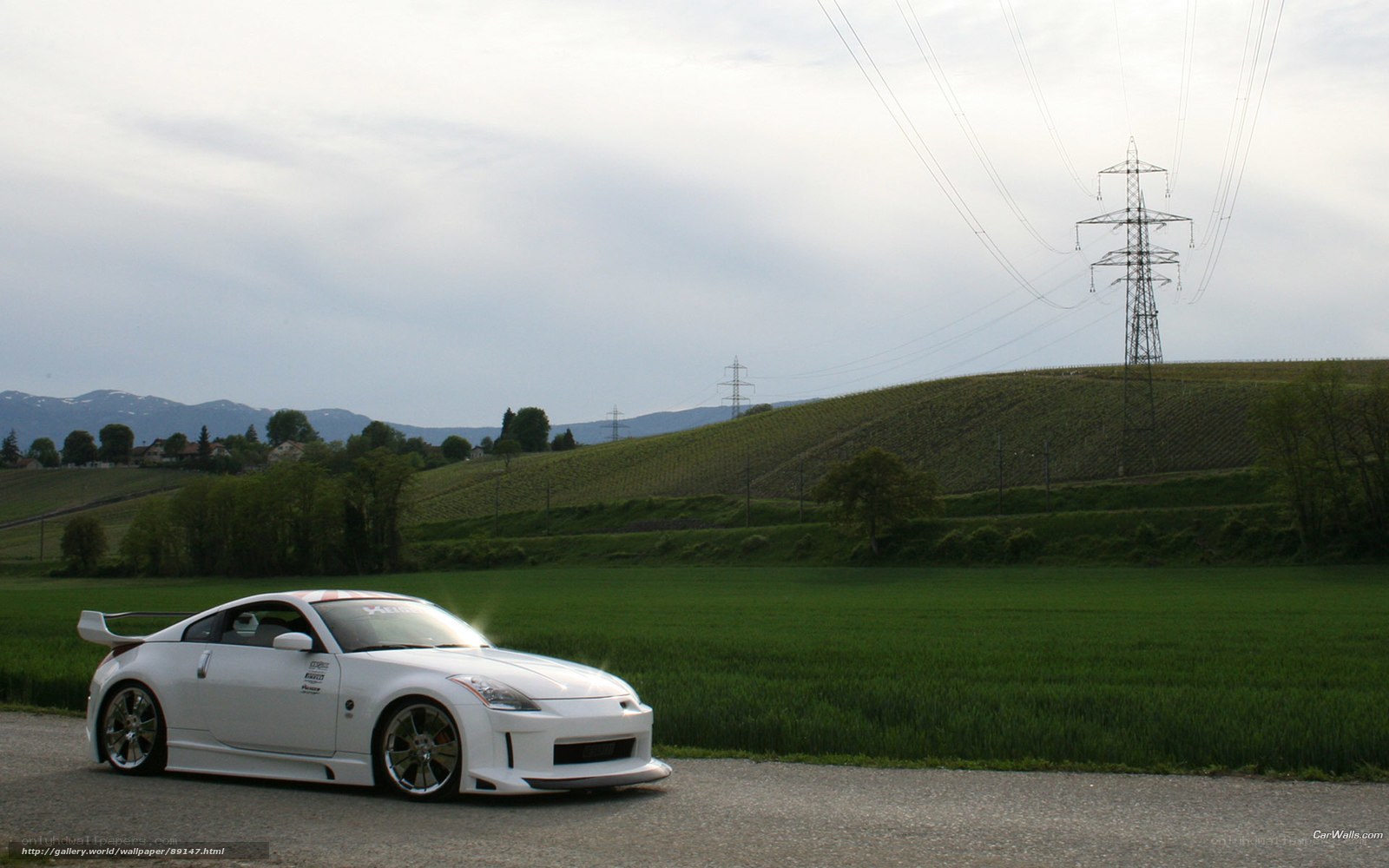White sports car on rural road