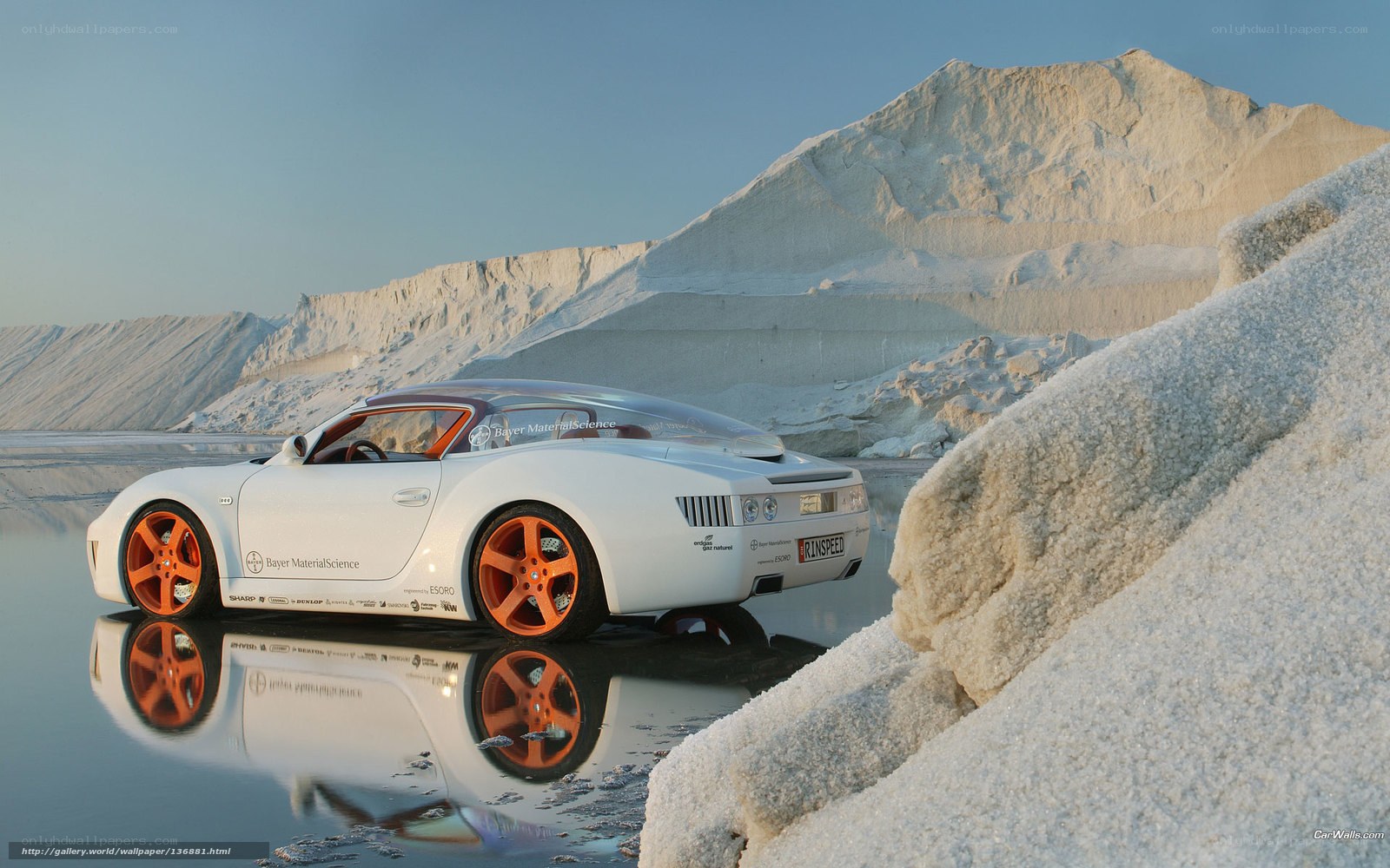 White sports car on salt flats