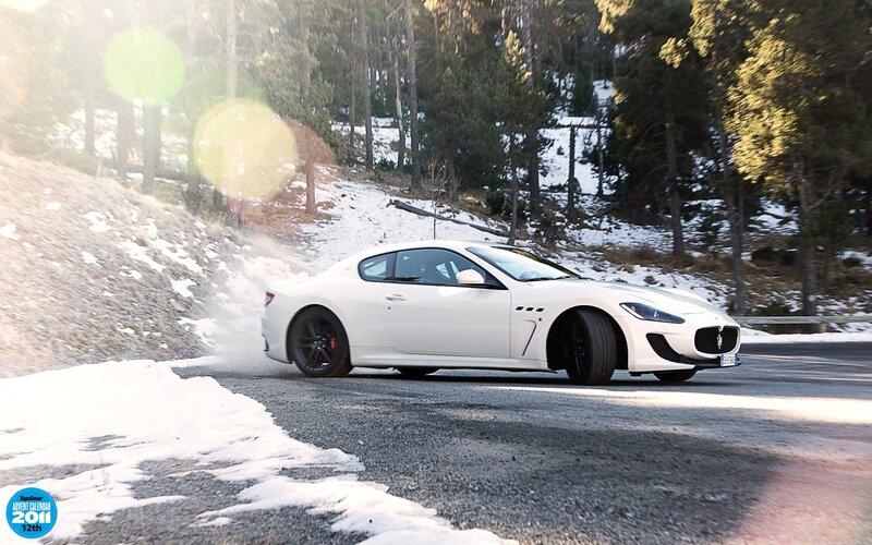 White sports car on snowy road