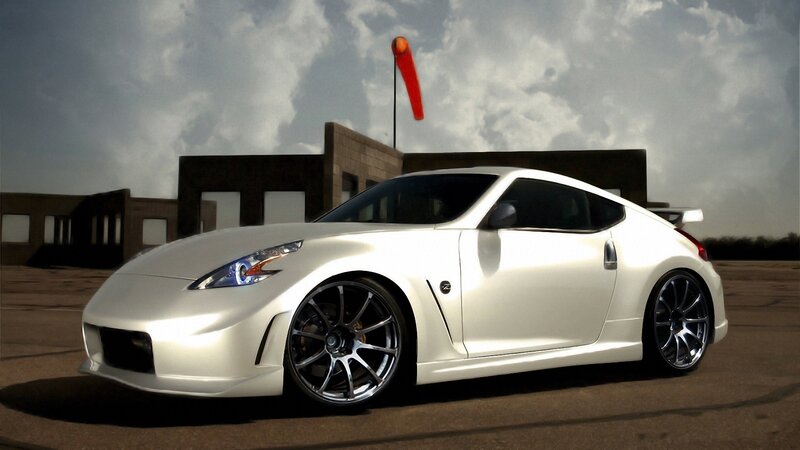 White sports car on tarmac