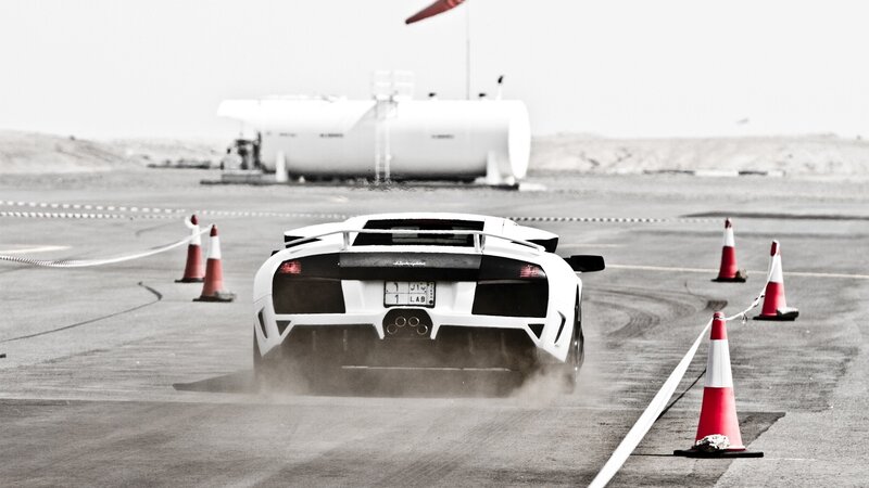 White sports car on track