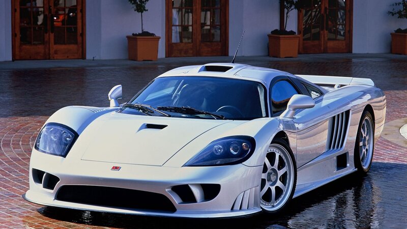 White sports car on wet pavement