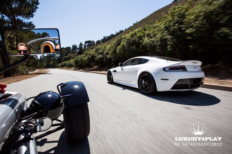 White sports car on winding road