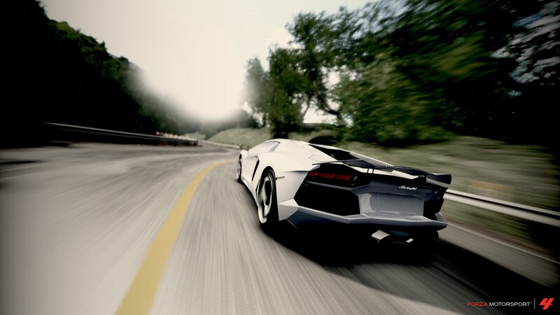 white sports car on winding road